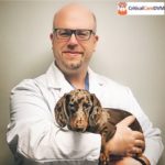 Dr Christopher Byers with a daushound