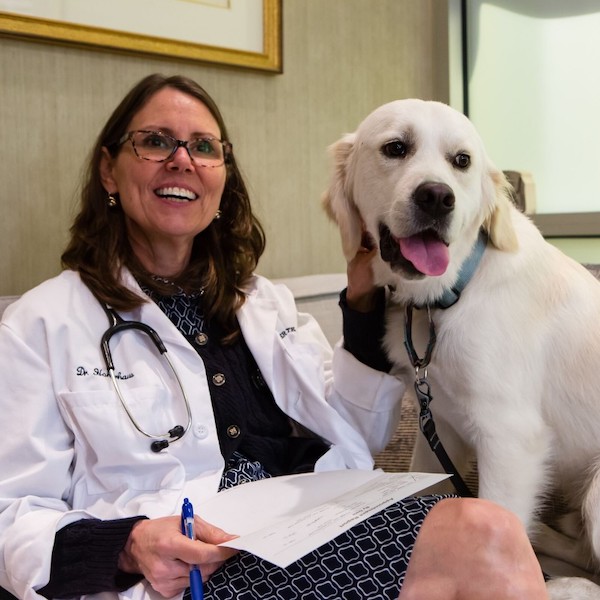 Dr. Ann Hoenhaus with a lab